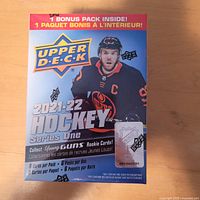 Front of sealed blaster box showing branding and pack information