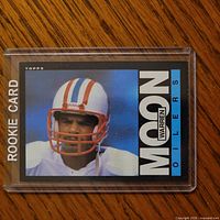 Front of Warren Moon rookie card in toploader