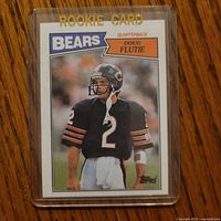 Front of 1987 Topps Doug Flutie rookie card in sleeve