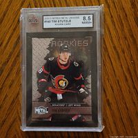 Front of graded Tim Stutzle rookie card showing KSA 8.5 label