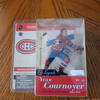 Front view of sealed Yvan Cournoyer NHL Legends Series 1 action figure packaging