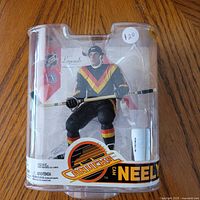 Front view of sealed Cam Neely figure in clamshell