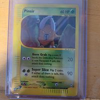 Front of Pinsir reverse holo card in sleeve