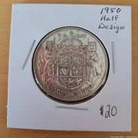 Coin reverse showing Coat of Arms, denomination and date in cardboard flip