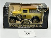 Front of boxed coin bank showing vehicle through window and 1931 Ford Model A branding