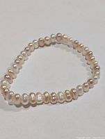 Oval freshwater pearl stretch bracelet showing full strand