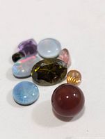 Group shot of all nine assorted gemstones