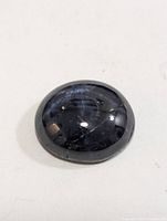 Top view of round cabochon star sapphire