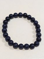 Full view of bracelet showing all beads and elastic loop