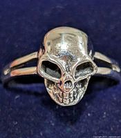 Front view of silver skull ring