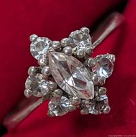 Front view showing marquise center and surrounding stones