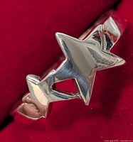 Front view showing double star design on silver ring