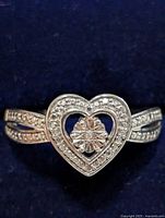 front view of heart-shaped diamond ring