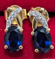 Front view showing design, blue stones, clear accents