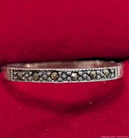 close-up of front of silver ring showing marcasite stones