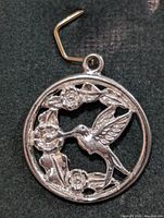 Front view showing full pendant design
