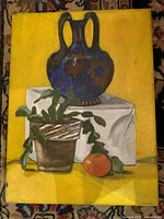 Full view of painting showing urn, plant, orange on yellow background