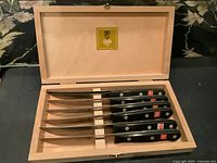 open fitted box showing six Wusthof Gourmet steak knives
