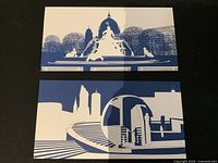 Two blue and white prints showing fountain scene and cityscape with sphere