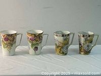 All four mugs front view