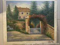 Full view of the framed oil painting showing gate scene