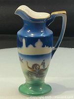 Front view showing gondola scene, gradient glaze and profile