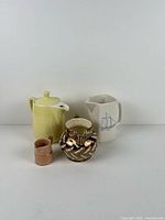 Group shot of all four ceramic jugs