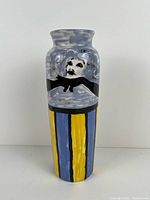 Front view showing portrait and stripe design