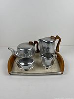 Full view of all five pieces on tray