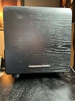 Front view showing Cerwin-Vega logo and woodgrain cabinet