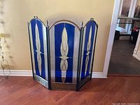Front view of 3-panel cobalt blue stained glass partition