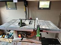 Full view of Haussmann table saw on stand showing table surface and fence