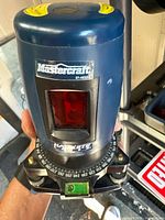 Front of Mastercraft Hawkeye laser level showing emitter window and base