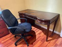 Desk and chair together showing overall style and scale