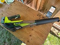 Full view of Ryobi cordless blower with battery attached