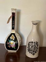 Front view of both vase and decanter