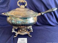 Chafing dish assembled on stand with lid and handle attached