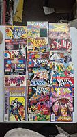 Tabletop view of 16 Marvel X-Men and Wolverine related comic books