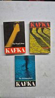 Front covers of three Franz Kafka paperback books