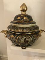 Full view of Satsuma covered tureen showing lid, handles, feet and overall decoration