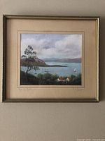 Full view of framed painting showing image, mat and wood frame