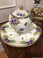 Set showing candy bowl on tray, displaying violet design and gold accents