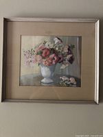 Full view of framed watercolor painting on wall