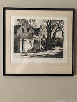 Full view of framed etching on wall