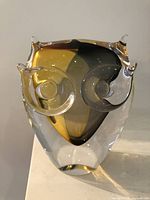 Front view showing owl form, eyes and color layers