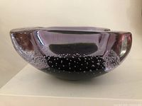 Side view showing lilac hue and bullicante bubbles