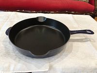 Top angled view of the deep frypan showing interior, exterior colour and both handles