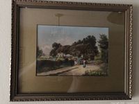 Full view of framed lithograph on wall