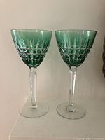 Two green St Louis Manhattan wine glasses full view