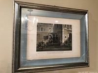 Full view of framed engraving showing frame, mat, and print